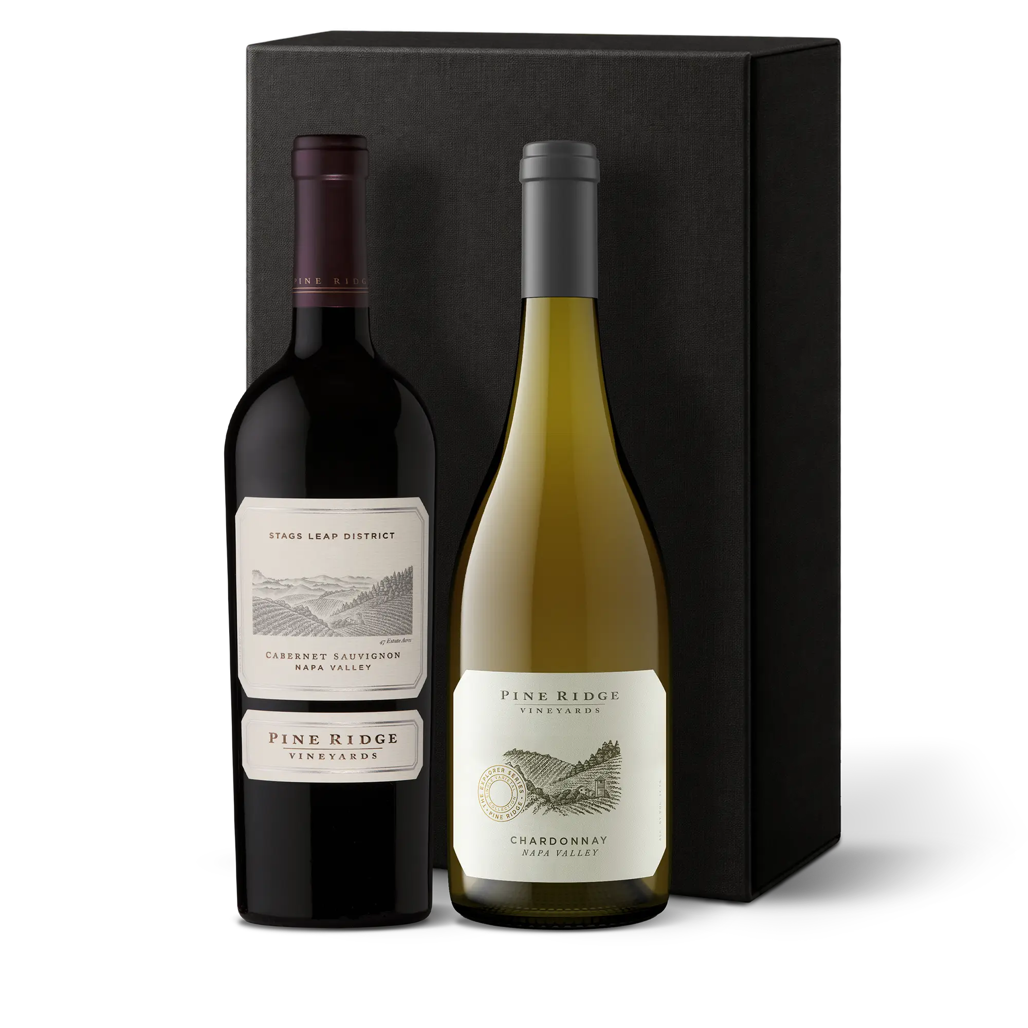 Two bottles of Pine Ridge Vineyards wine, one red and one white, are placed side by side in front of a tall black gift box. Showcasing Cabernet Sauvignon and Chardonnay, this Napa Valley Favorites 2-Bottle Gift perfectly pairs two classic varietals for any occasion.