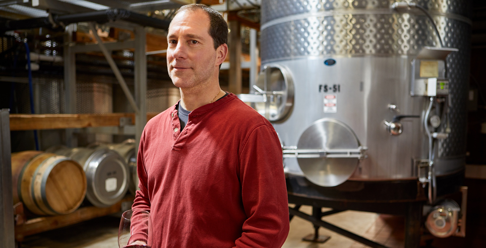 Assistant Winemaker Mike Conversano in the winery