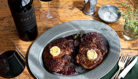 Ribeye with Thyme and Shallot Compound Butter and Red Wine Reduction Sauce