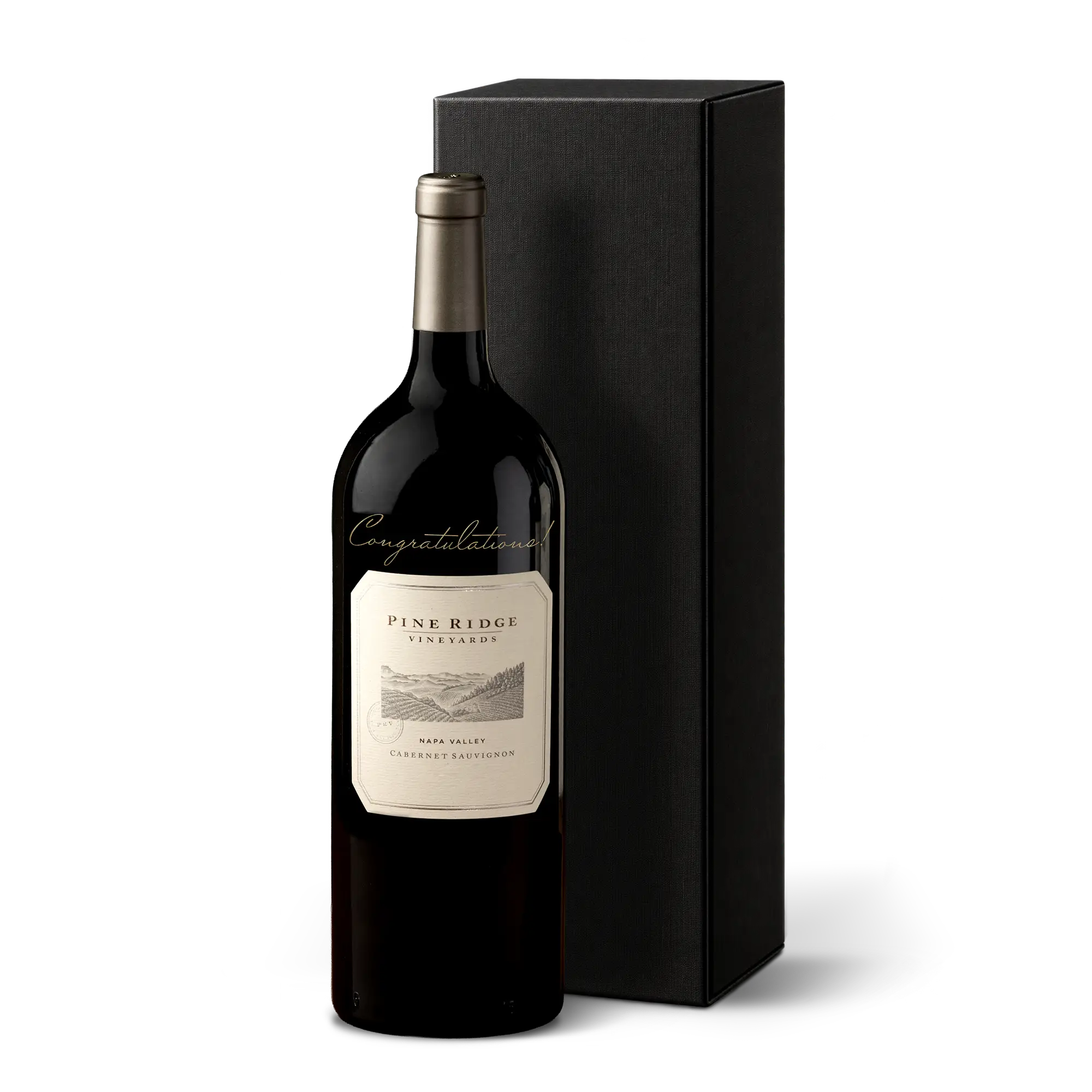 A large bottle of Pine Ridge Vineyards Cabernet Sauvignon stands in front of a tall, black rectangular box. This Bordeaux Luxe Wine Gift features a wine bottle with a cream label and the word Congratulations written in script on the glass.