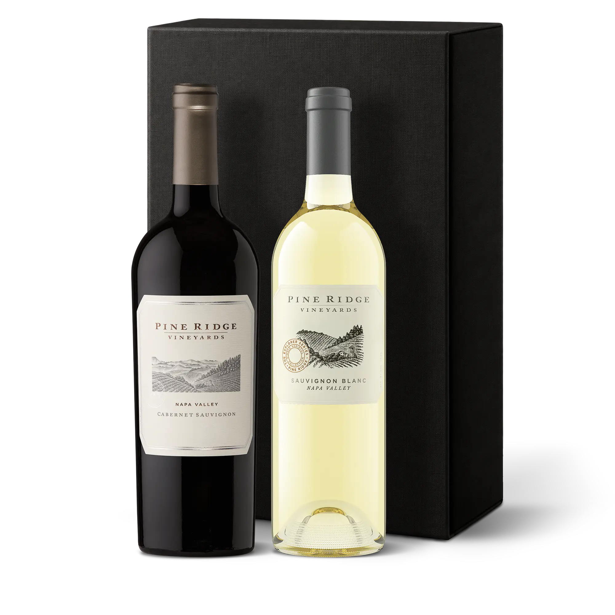 Two bottles of Pine Ridge Vineyards wine, one red and one white, stand next to a tall black gift box. The labels read Cabernet Sauvignon and Sauvignon Blanc, both from Napa Valley—perfectly showcasing this Napa Valley Favorites 2-Bottle Gift.