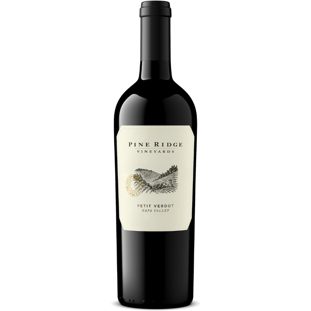 A bottle of Pine Ridge Vineyards Petit Verdot wine with a cream-colored label featuring a vineyard illustration and text indicating it is from Napa Valley. The bottle has a black foil capsule.